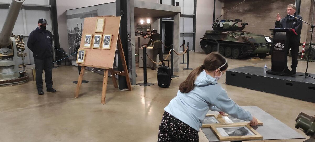 Relatives hung up framed photographs of the men on the night. Relatives hung up framed photographs of the men on the night.