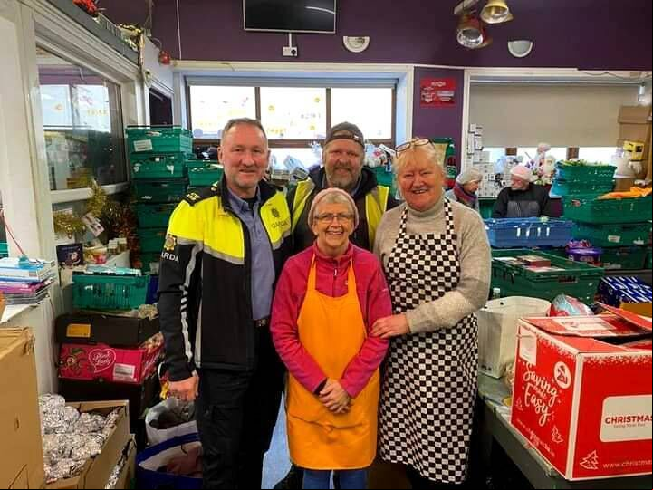 Community Garda, Liam Ryan (left) with Caitriona (right), Olive and Tom of Cork Penny Dinners.