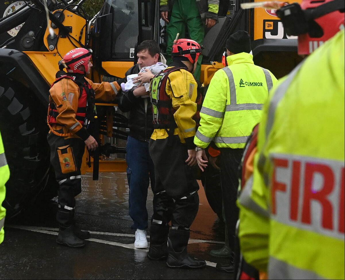 Locals rescued in from the flooding in Midleton . Picture: Eddie O'Hare Locals rescued in from the flooding in Midleton . Picture: Eddie O'Hare