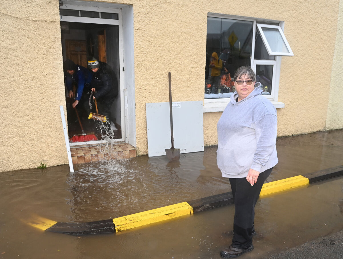 Claire O'Flynn, outside her house in Rathcormac which was flooded yesterday. Picture; Eddie O'Hare Claire O'Flynn, outside her house in Rathcormac which was flooded yesterday. Picture; Eddie O'Hare