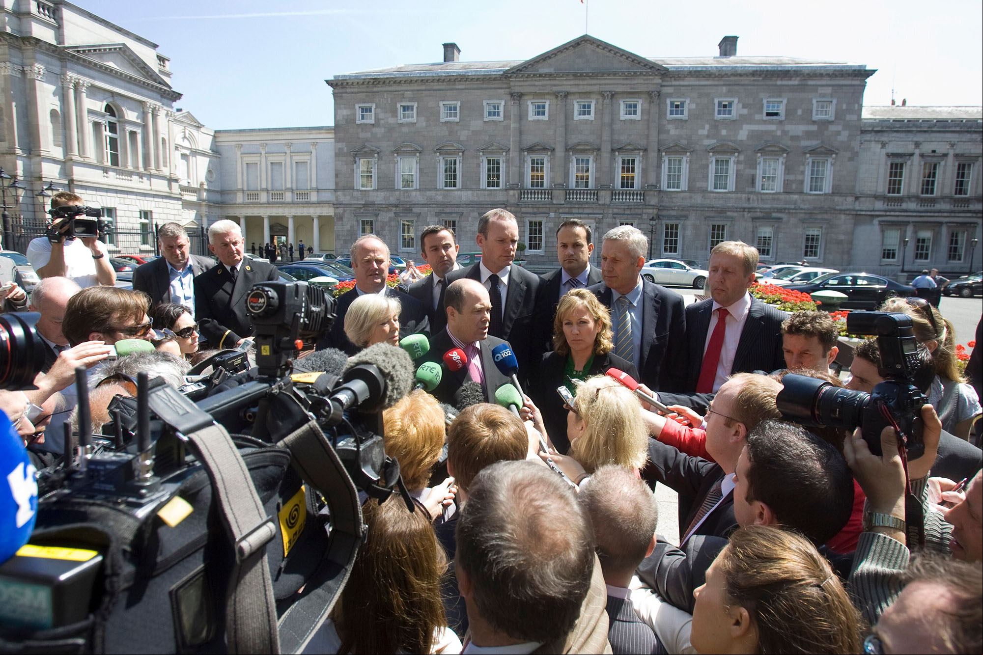 Fine Gael Crisis. Nine of the Fine Gael Front Bench speak to the media outside the Dail after Enda Kenny adjourned a meeting held to discuss his leadership. They are L to R front, Olivia Mitchell, Denis Naughten, Olwyn Enright, back Billy Timmins, Brian Hayes, Simon Coveney, Leo Varadkar, Fergus O'Dowd, Michael Creed. June, 2010.