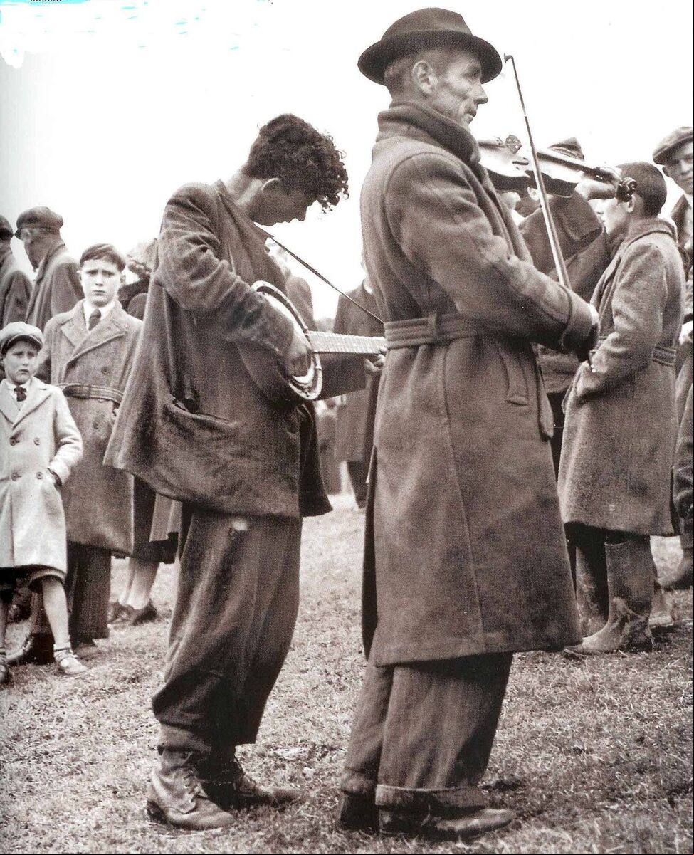 Paddy Dunne with Fred Williams (Cork) busking at a match in Clare. The Williams family operated a fun fare in the northern suburbs. Paddy Dunne with Fred Williams (Cork) busking at a match in Clare. The Williams family operated a fun fare in the northern suburbs.
