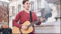 Guitar Player Singing