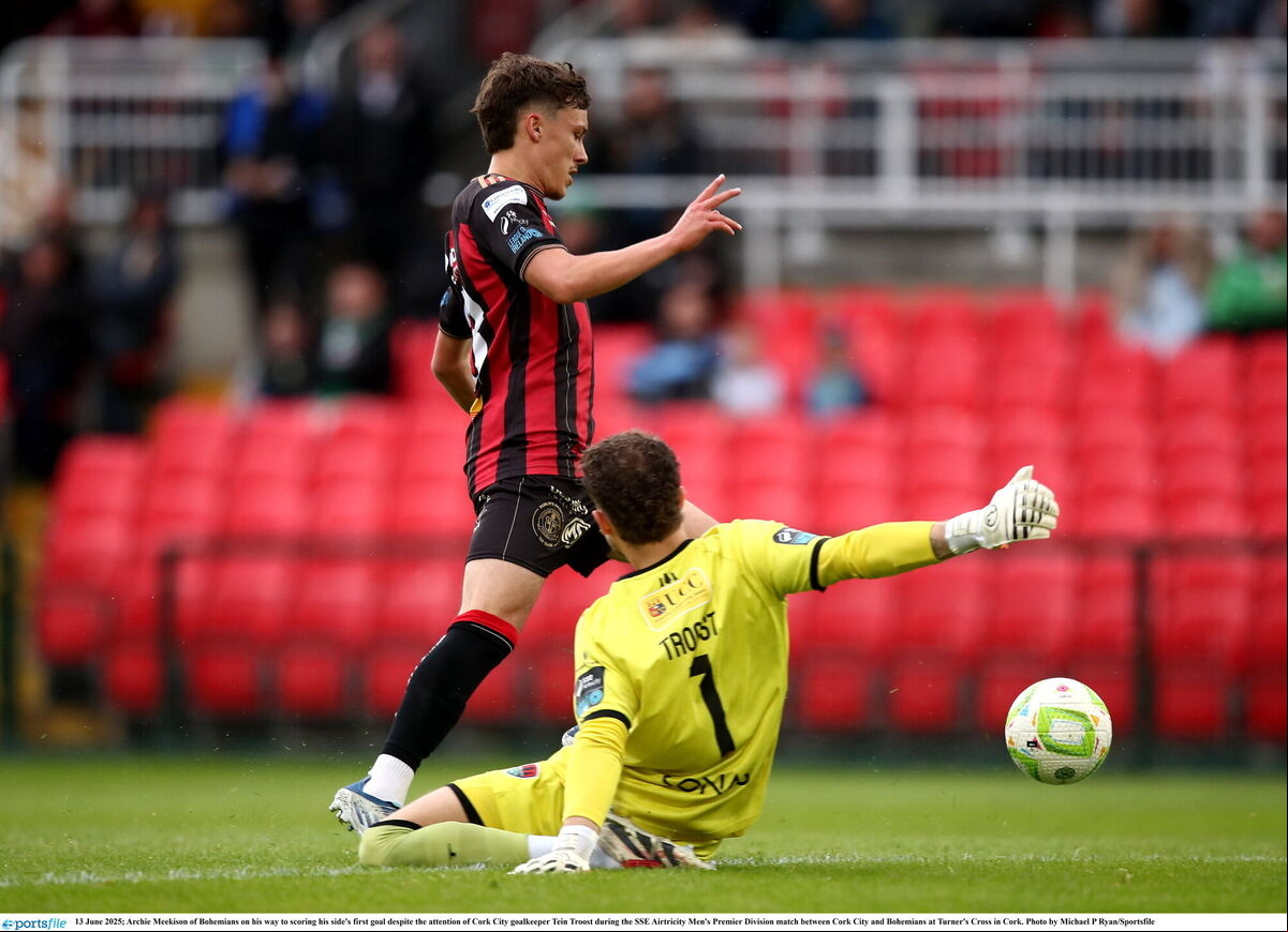 Archie Meekison of Bohemians on his way to scoring his side's first goal despite the attention of Cork City goalkeeper Tein Troost. Picture: Michael P Ryan/Sportsfile Archie Meekison of Bohemians on his way to scoring his side's first goal despite the attention of Cork City goalkeeper Tein Troost. Picture: Michael P Ryan/Sportsfile
